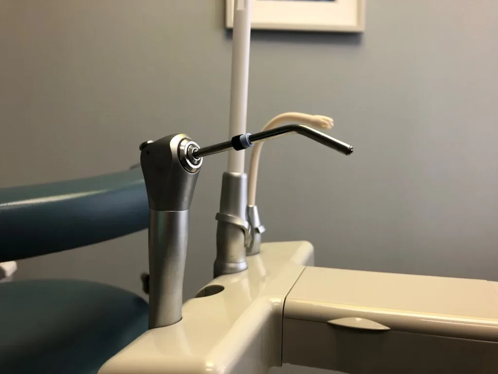 Dental floss being used to clean between teeth
