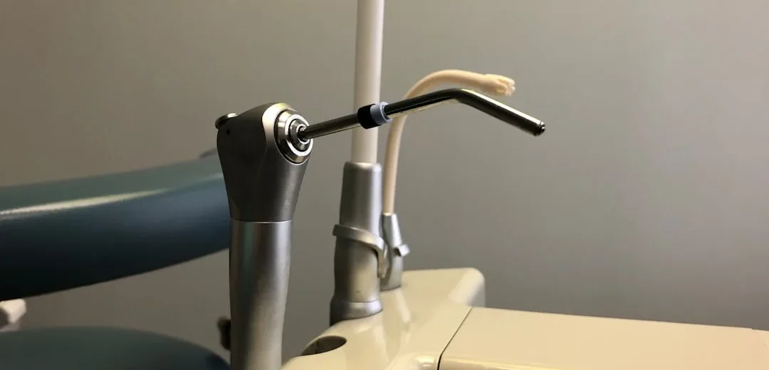 Dental floss being used to clean between teeth