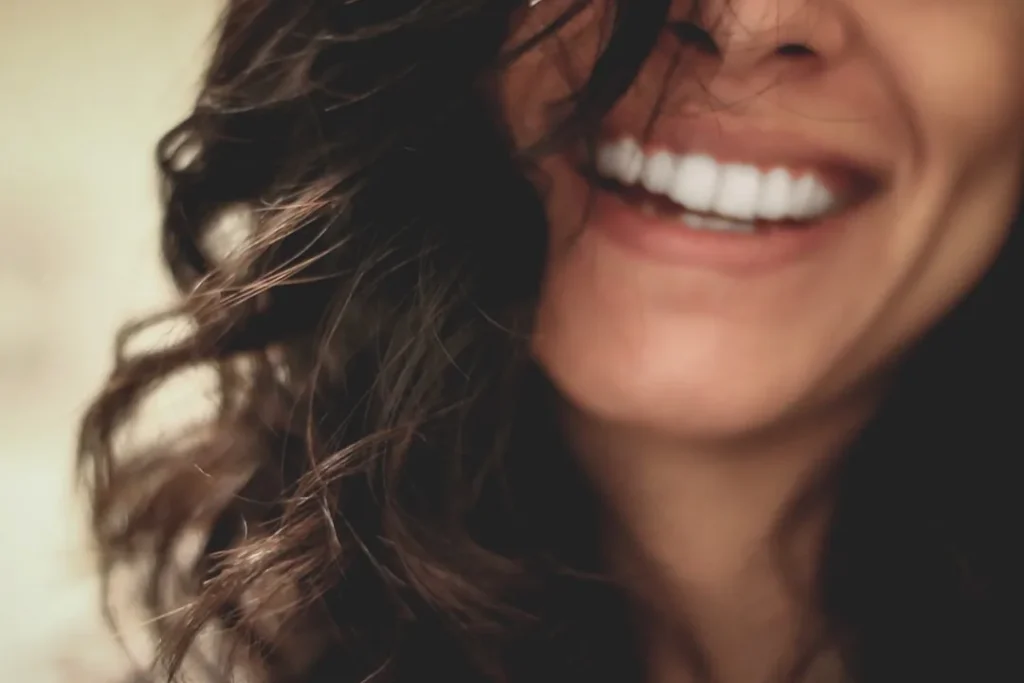 An adult with a healthy smile