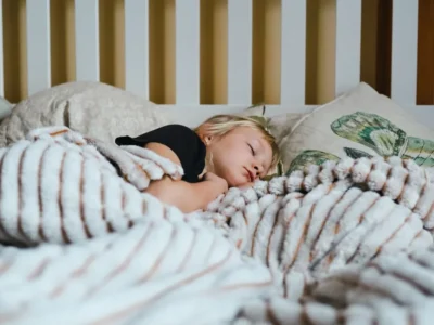A child asleep in bed